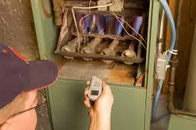 checking pilot light of furnace